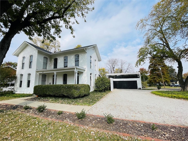 view of front of home with a garage and covered porch