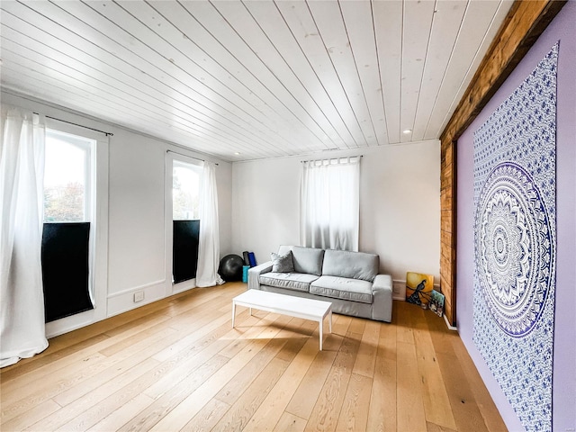 living room with wood ceiling and hardwood / wood-style flooring