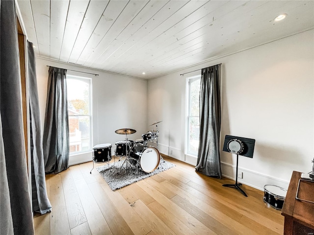 miscellaneous room featuring wooden ceiling and light hardwood / wood-style floors