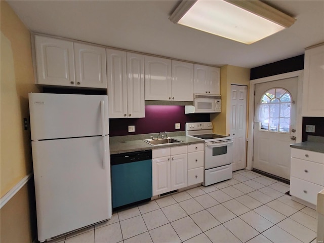 kitchen featuring white cabinets, white appliances, light tile patterned floors, and sink