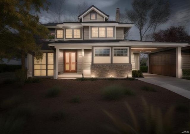 view of front of home featuring a carport