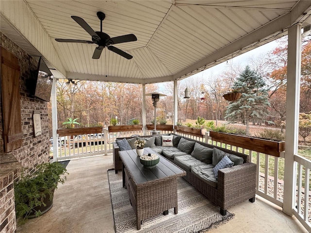 view of patio / terrace featuring ceiling fan and an outdoor living space