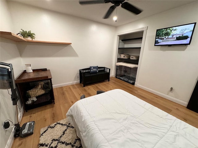 bedroom featuring ceiling fan and light hardwood / wood-style floors