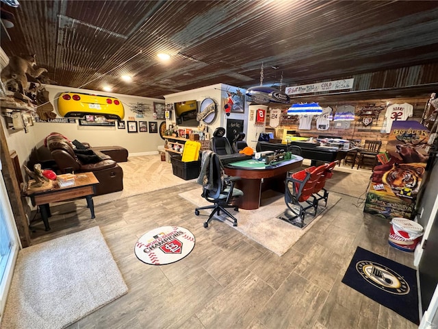 rec room with hardwood / wood-style floors