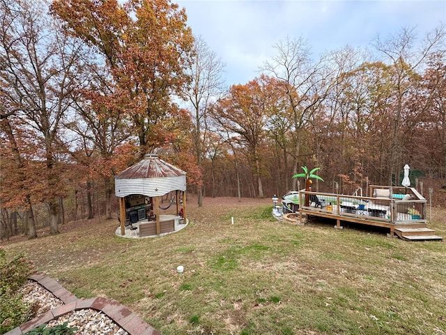 view of yard with a gazebo and a deck