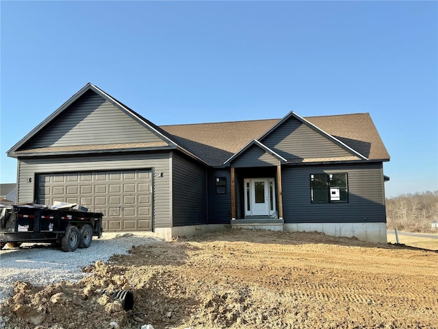 view of front facade with a garage and driveway