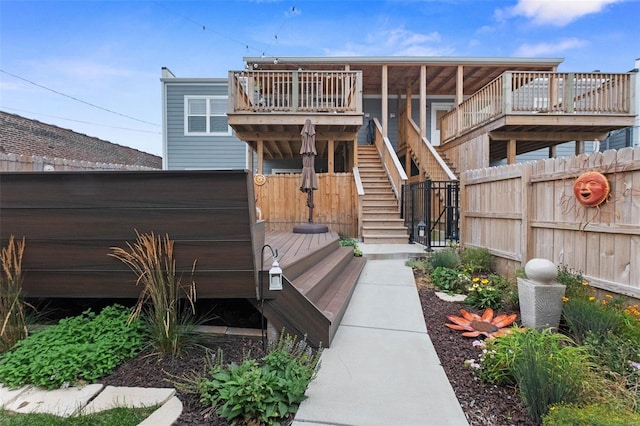 view of front facade featuring a wooden deck