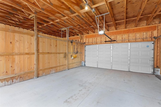 garage featuring a garage door opener