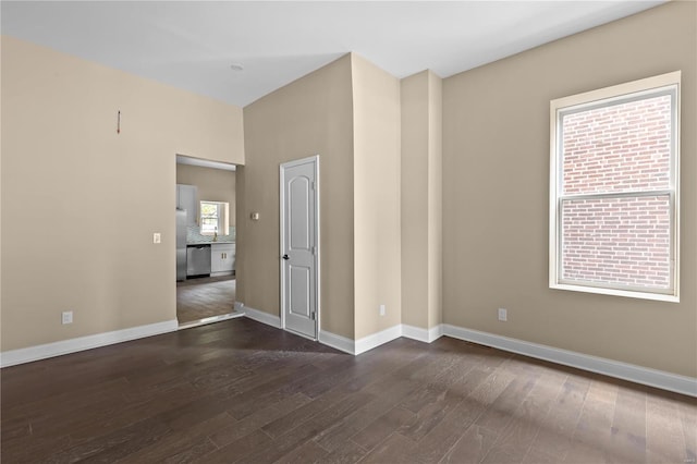 empty room featuring dark hardwood / wood-style floors