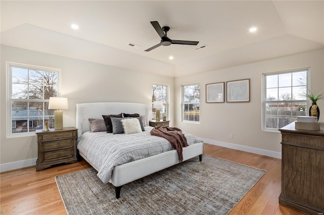 bedroom featuring ceiling fan and light hardwood / wood-style flooring