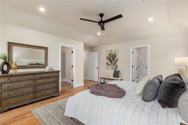 bedroom featuring vaulted ceiling, ceiling fan, and light hardwood / wood-style flooring