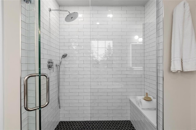 bathroom with an enclosed shower