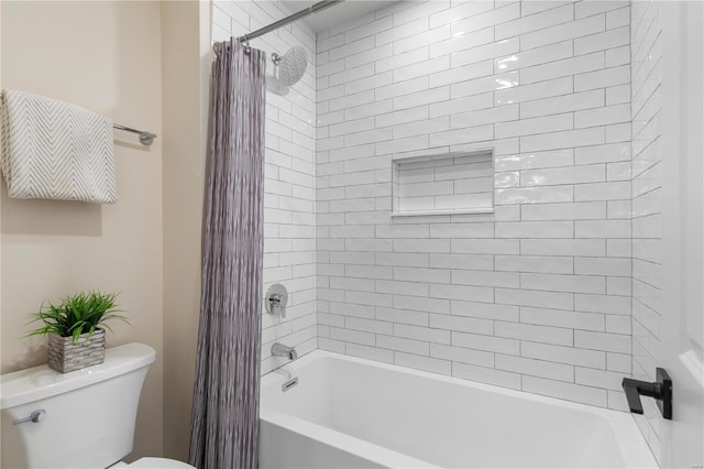 bathroom featuring shower / bathtub combination with curtain and toilet