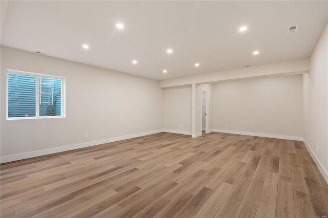 basement featuring light hardwood / wood-style floors