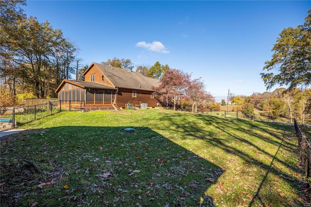 view of yard featuring a sunroom