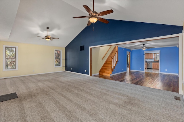 unfurnished living room featuring ceiling fan, hardwood / wood-style floors, and lofted ceiling