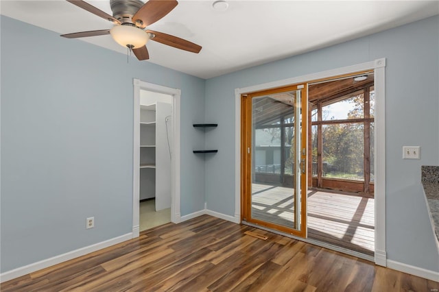 entryway with ceiling fan and dark hardwood / wood-style floors