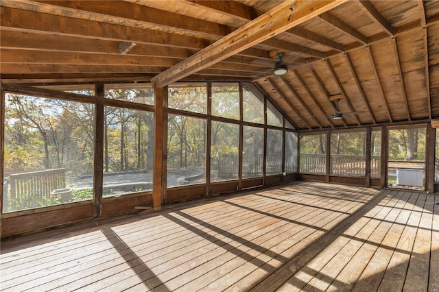 unfurnished sunroom with lofted ceiling and wood ceiling