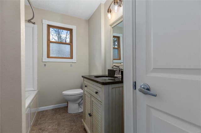 full bathroom featuring  shower combination, vanity, a textured ceiling, and toilet