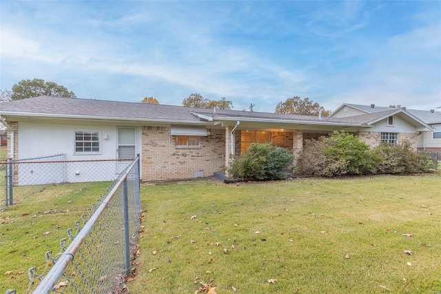 ranch-style house with a front yard