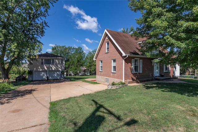 view of home's exterior featuring a garage and a yard