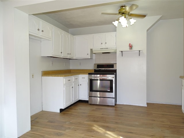 kitchen featuring stainless steel electric stove, tasteful backsplash, white cabinetry, ceiling fan, and dark wood-type flooring