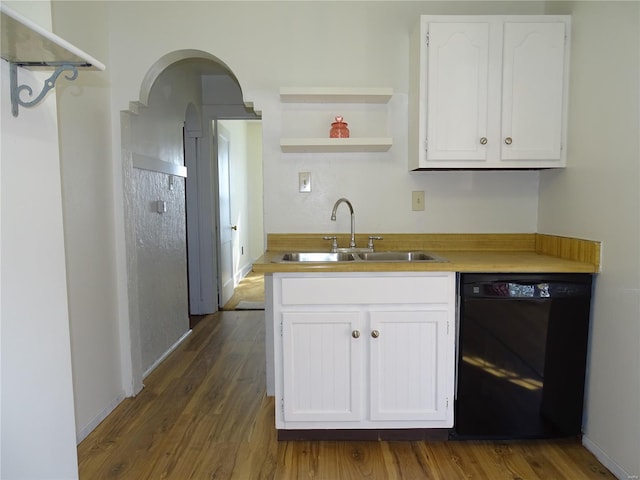 kitchen featuring dark hardwood / wood-style floors, black dishwasher, sink, and white cabinets