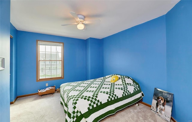 bedroom featuring ceiling fan and carpet floors