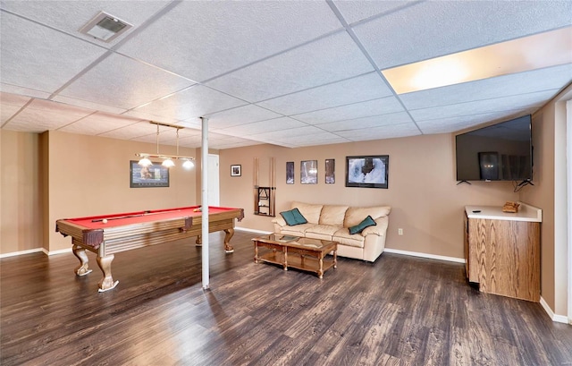 game room featuring dark hardwood / wood-style flooring, a paneled ceiling, and billiards