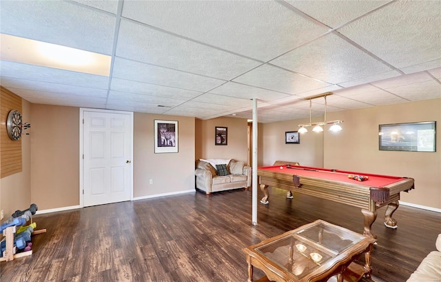 playroom with a drop ceiling, dark wood-type flooring, and billiards