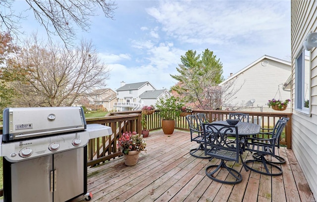 wooden deck with area for grilling