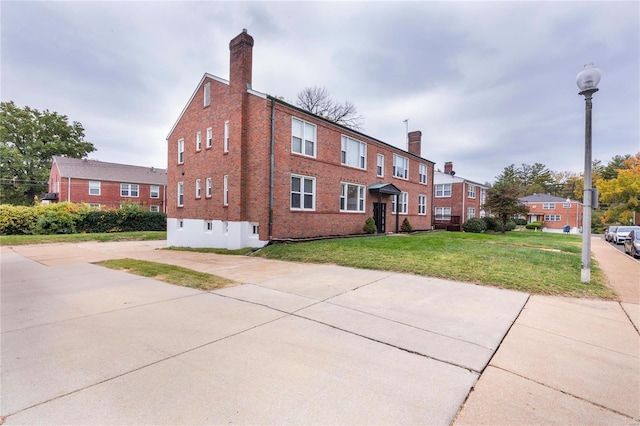 exterior space featuring a front lawn