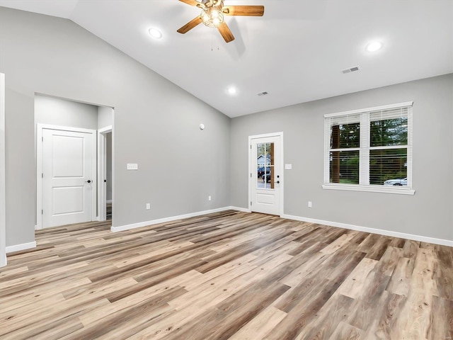 interior space with light hardwood / wood-style floors, plenty of natural light, lofted ceiling, and ceiling fan