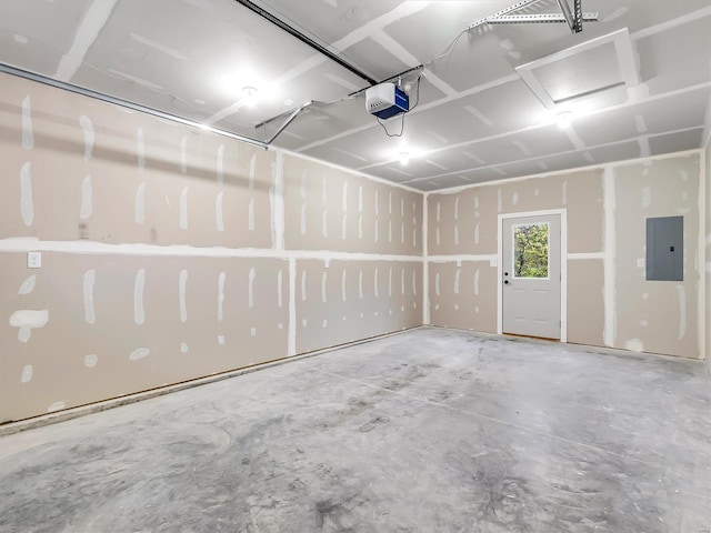 garage featuring a garage door opener and electric panel