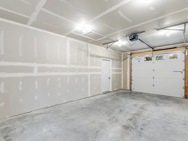 garage featuring a garage door opener