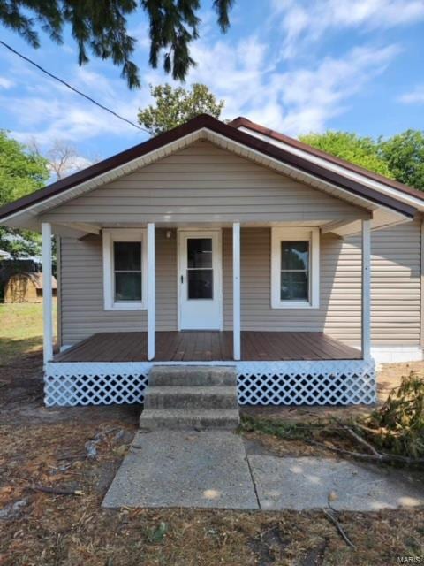 bungalow-style home featuring covered porch