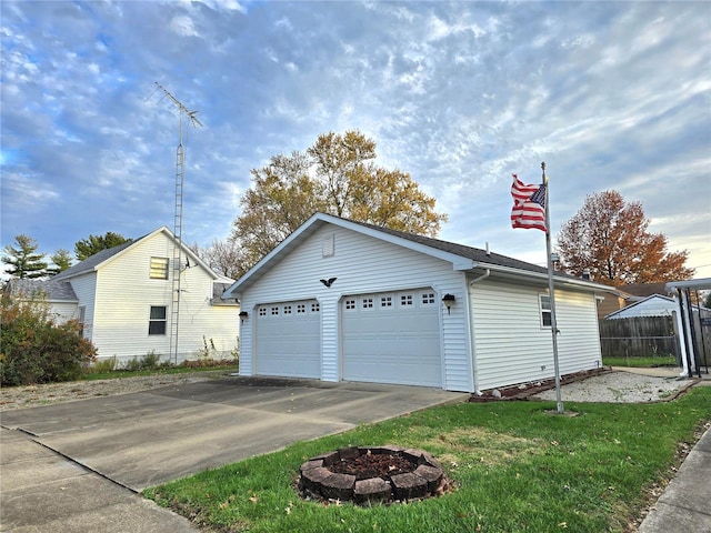 garage featuring a yard