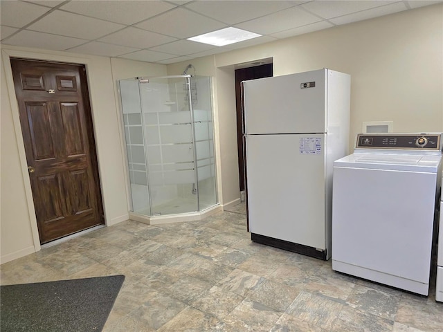 washroom with washer / clothes dryer