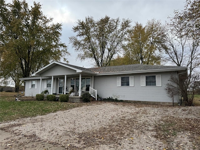 single story home with covered porch