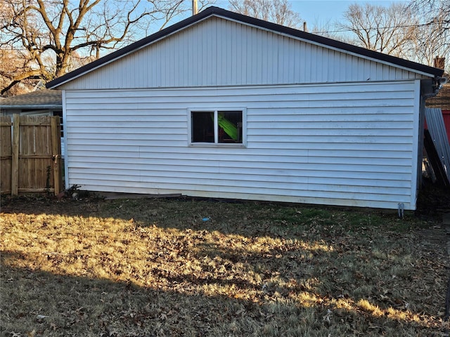 view of home's exterior featuring a lawn