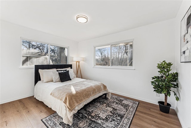 bedroom featuring hardwood / wood-style flooring