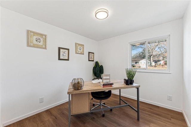 office space with dark hardwood / wood-style flooring