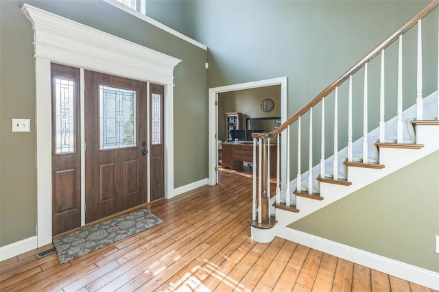 foyer entrance with wood-type flooring