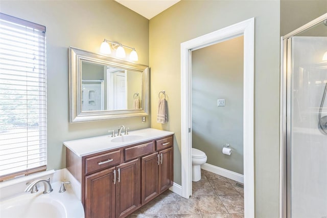 full bathroom with plus walk in shower, vanity, toilet, and tile patterned flooring