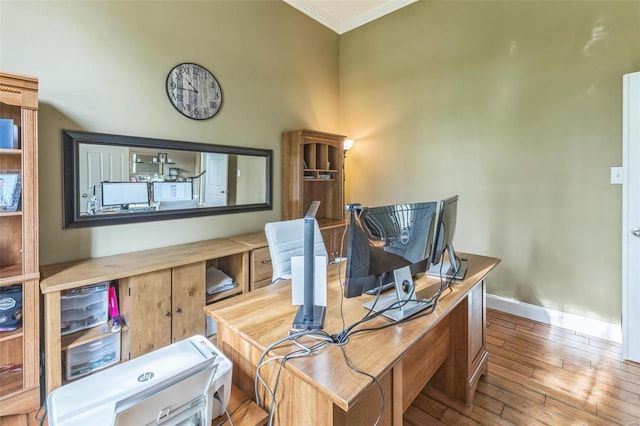 office featuring crown molding and light wood-type flooring