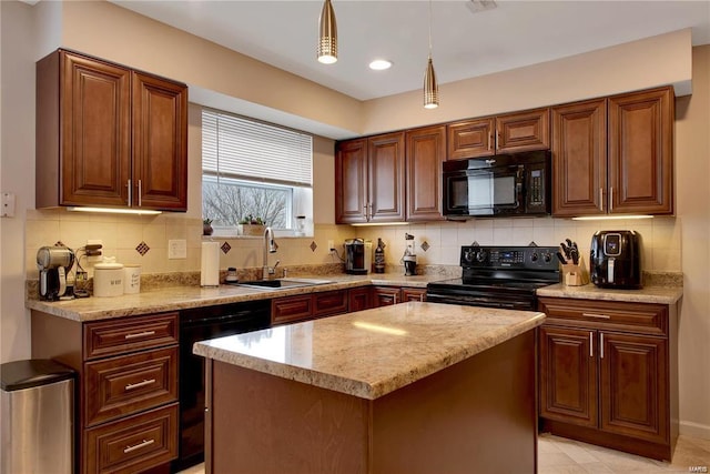 kitchen featuring a center island, hanging light fixtures, black appliances, sink, and backsplash