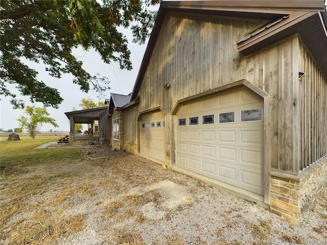 view of property exterior with a garage