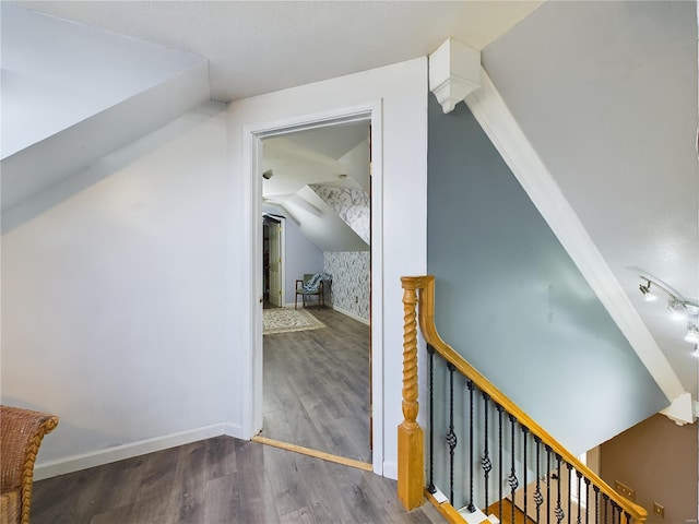 bonus room with dark hardwood / wood-style floors