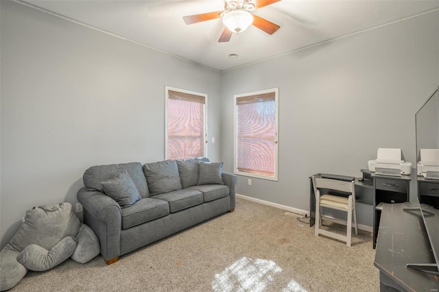 home office with light colored carpet and ceiling fan