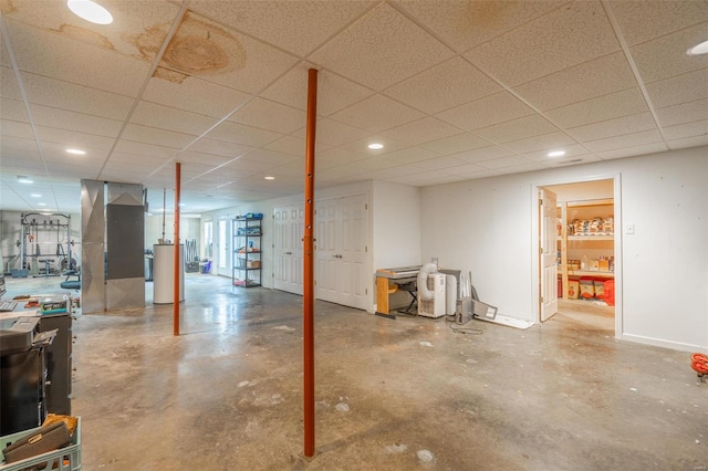 basement featuring a drop ceiling